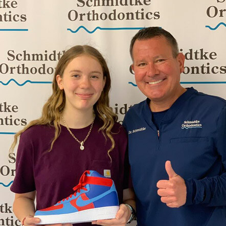 Patient smiling at our office